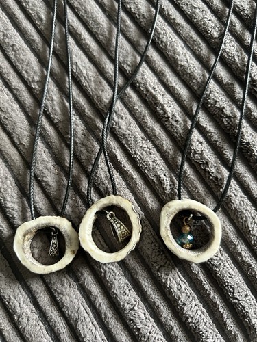 Stag horn necklaces - horn, hand